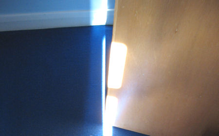 Bright light on blue carpet