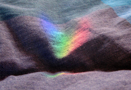Coloured light on a duvet cover